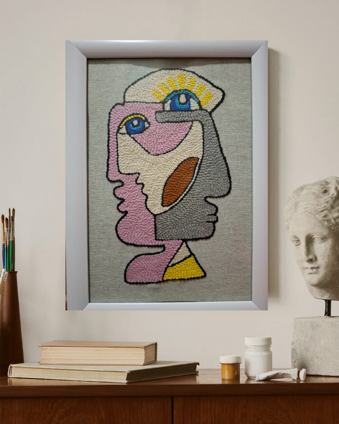 El yapımı çerçeveli punch tablo ( Soyut yüz figürü)